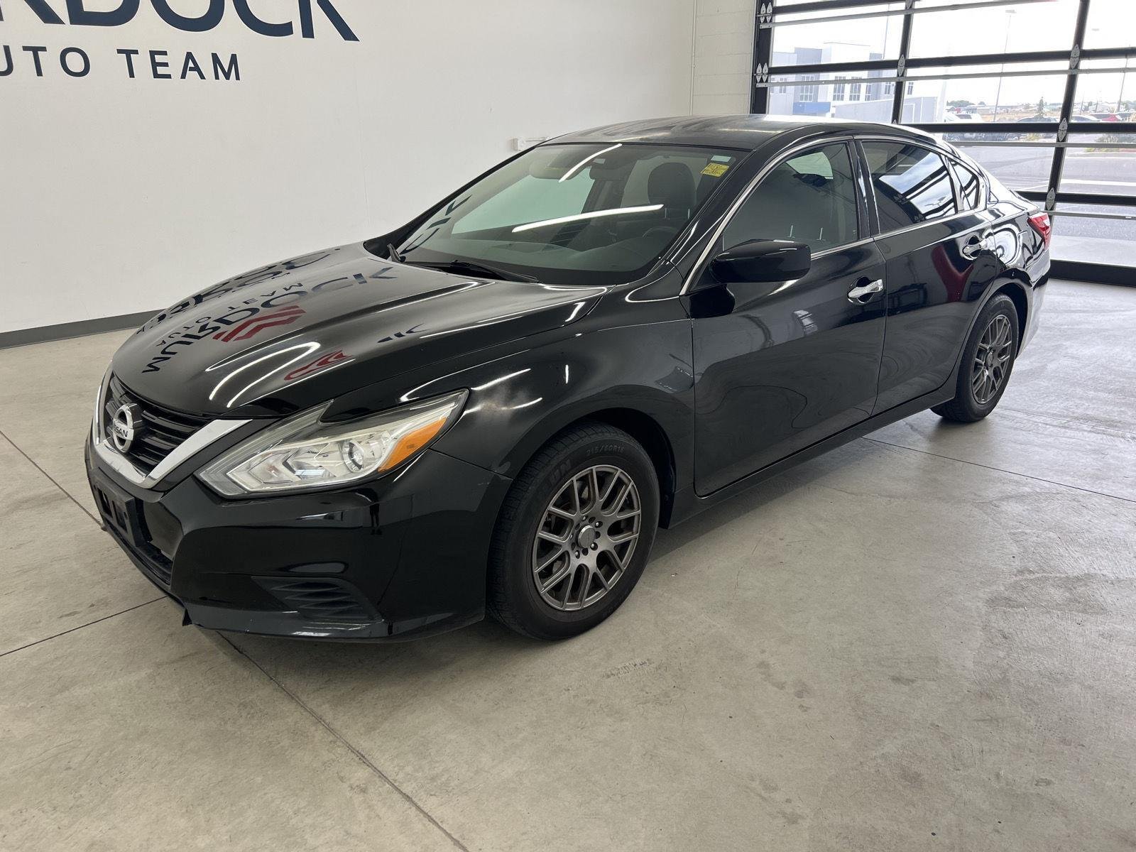 Used 2016 Super Black Nissan 2.5 S image 6