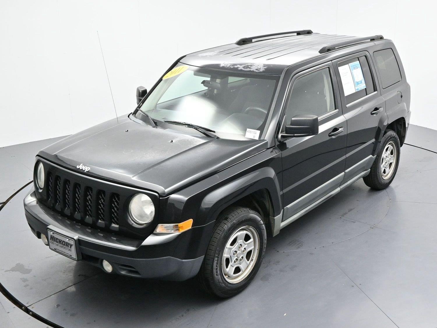 Used 2011 Brilliant Black Crystal Pearl Jeep Sport image 29