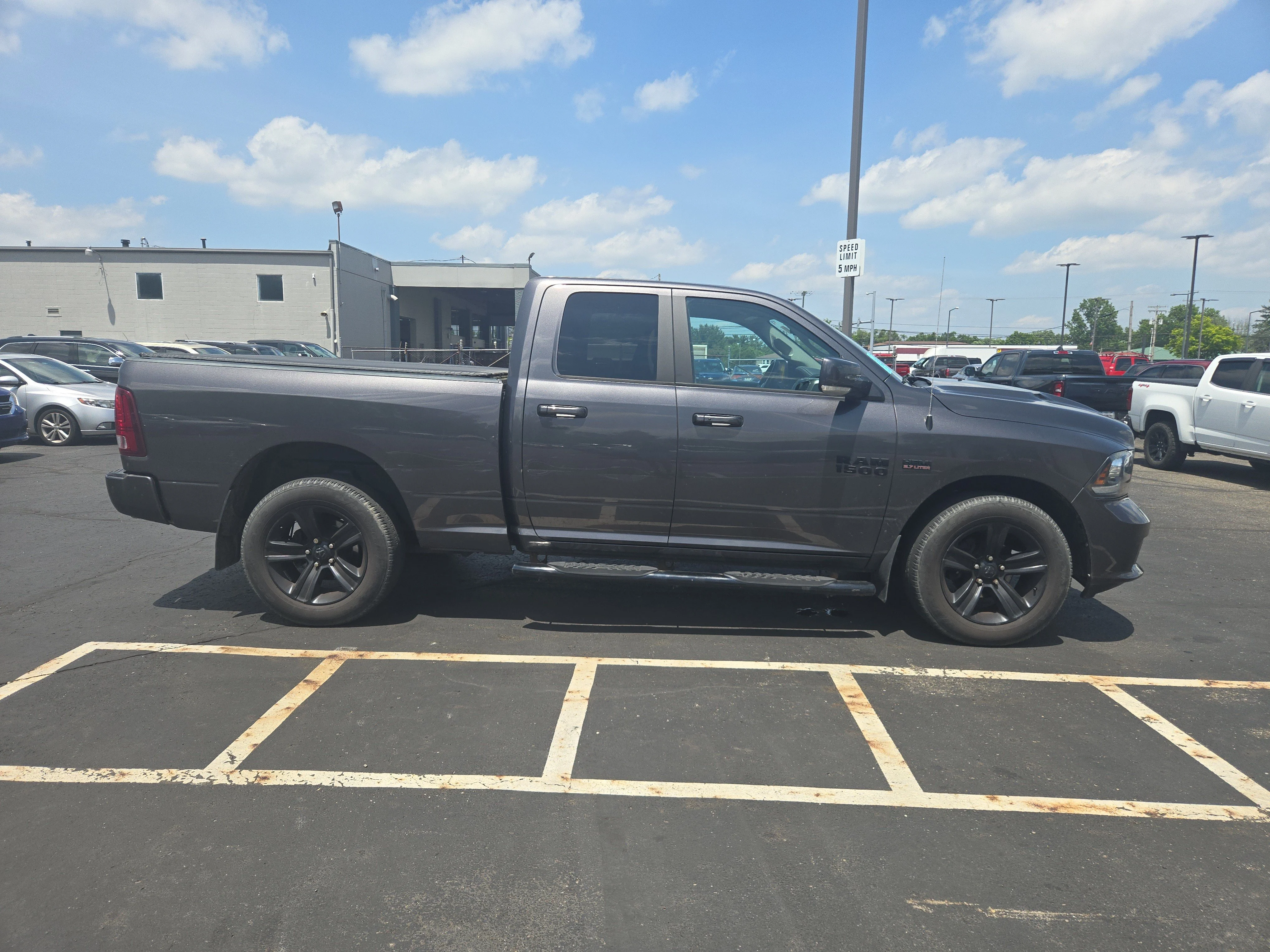 Used 2017 Granite Crystal Metallic Clearcoat Ram Night image 4