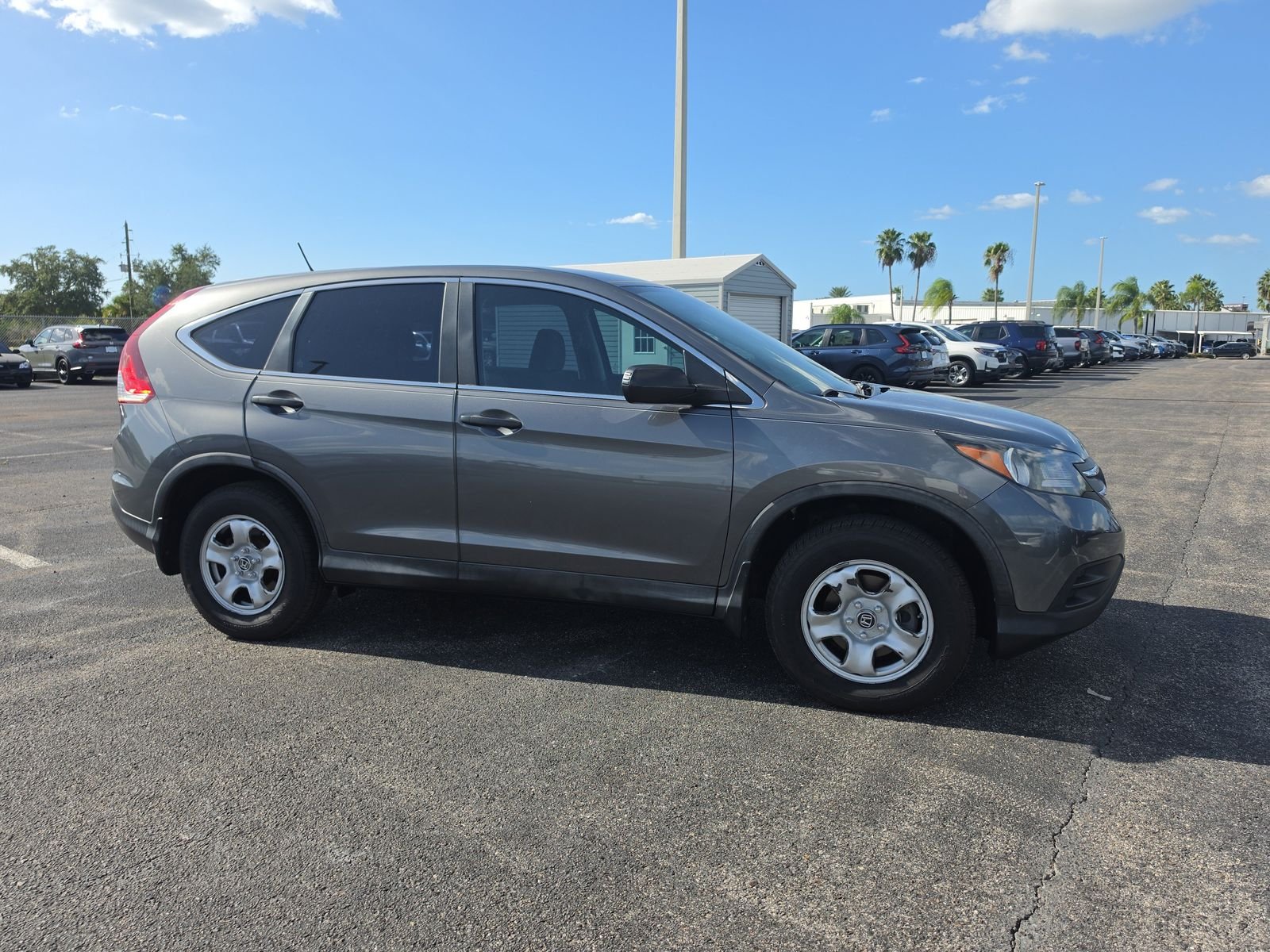 Used 2013 Honda CR-V LX with VIN 3CZRM3H31DG710032 for sale in Port Richey, FL