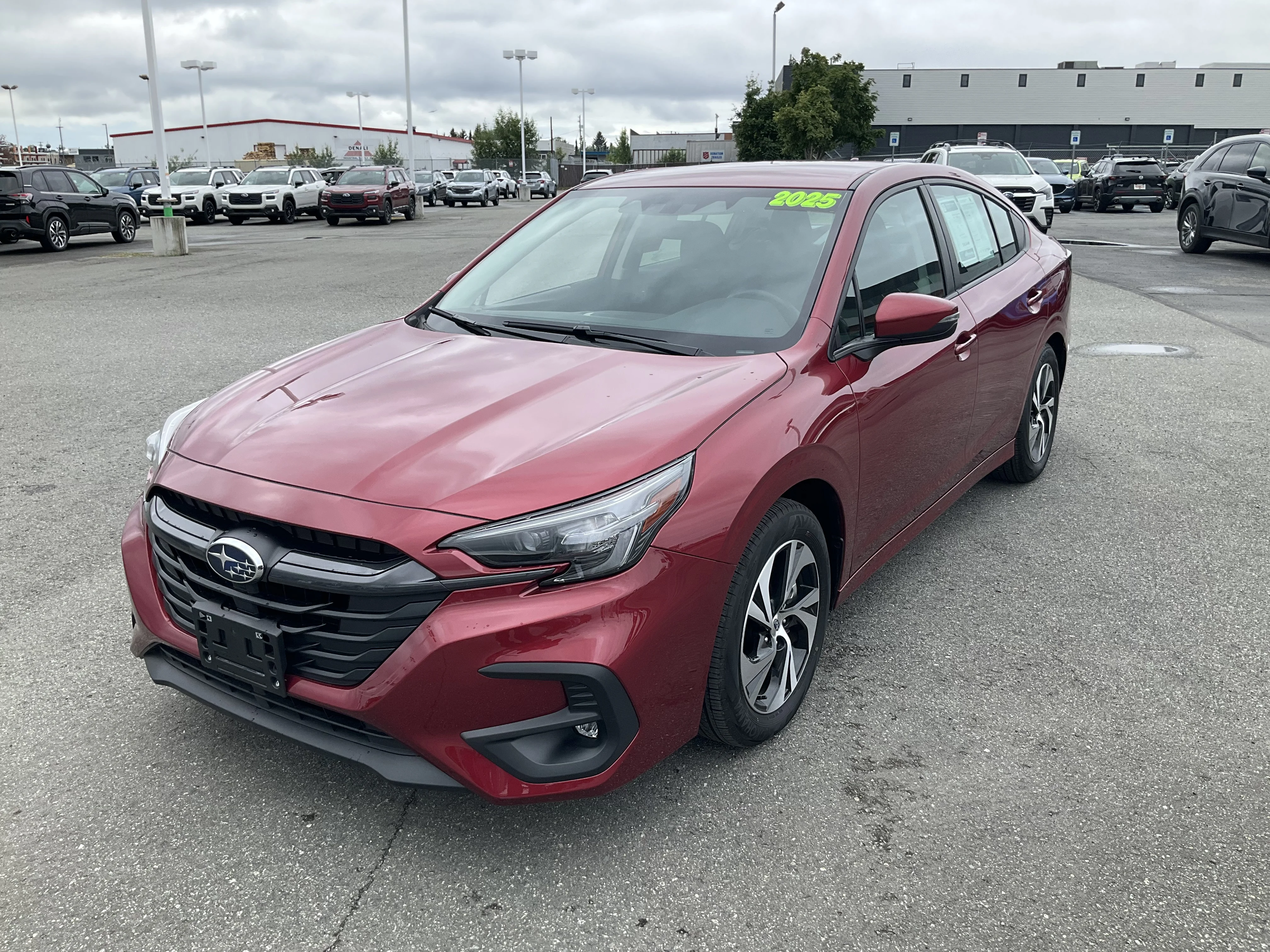 Used 2025 Crimson Red Pearl Subaru Premium image 1