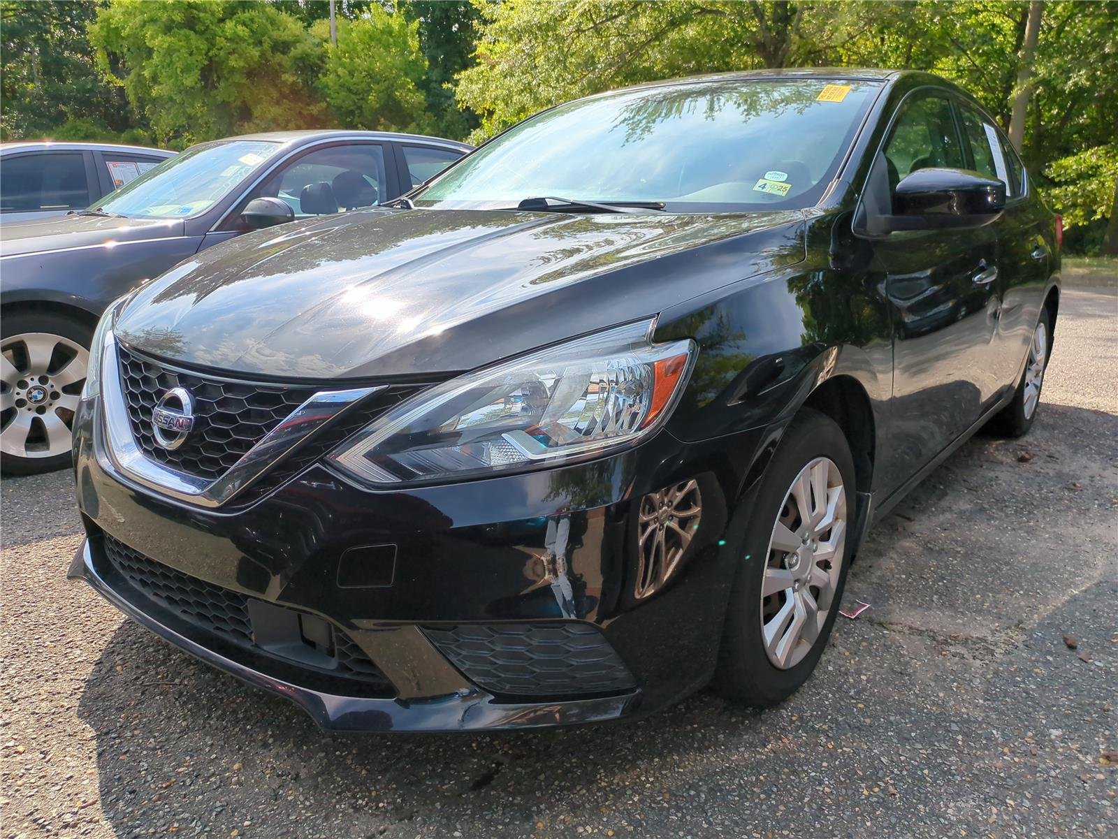 Used 2019 Super Black Nissan S image 2