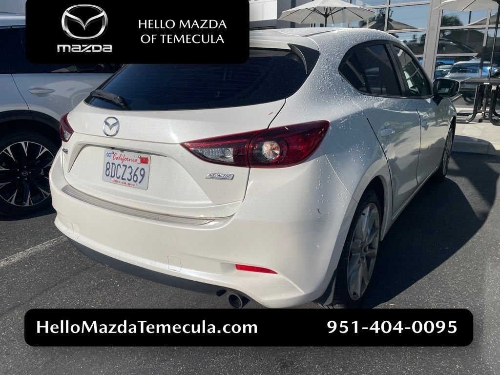 Used 2017 Snowflake White Pearl Mazda Touring 2.5 image 1