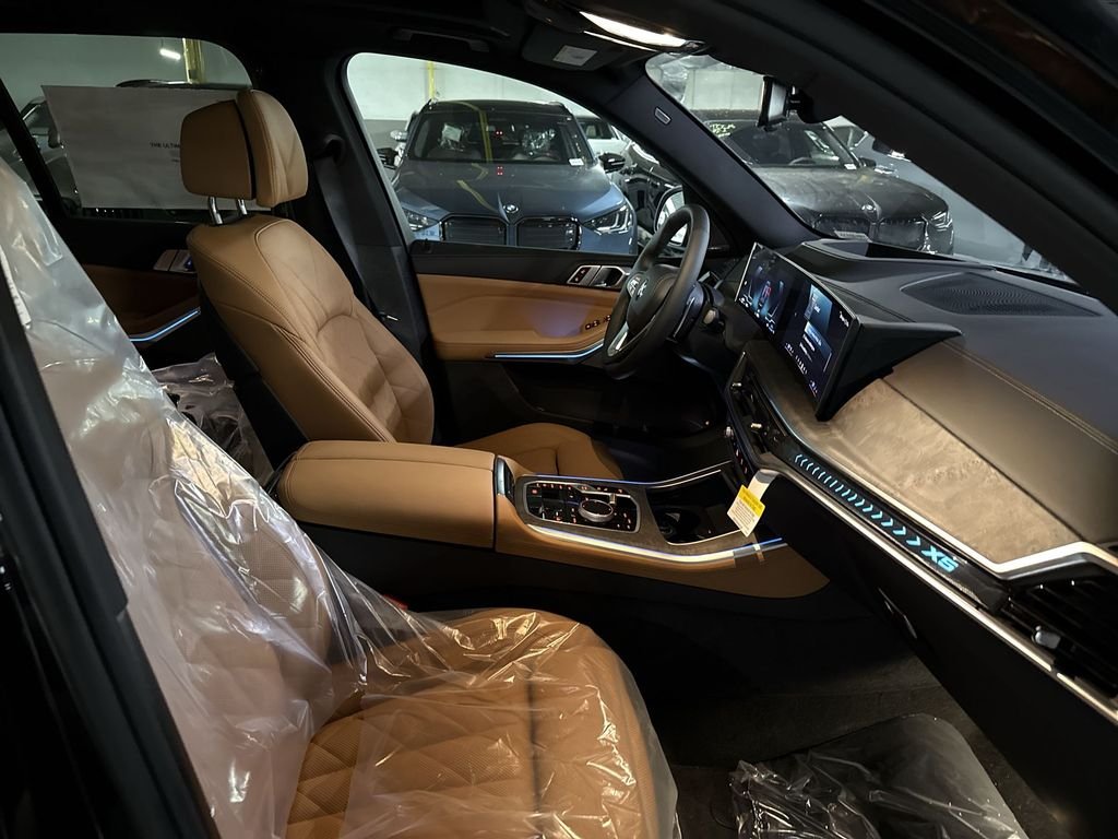 New 2026 Black Sapphire Metallic BMW xDrive50e image 25