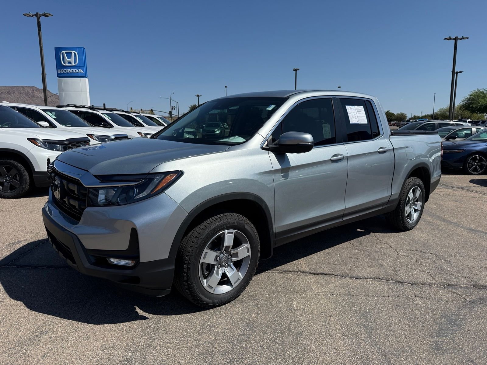 Certified Used 2025 Solar Silver Metallic Honda AWD RTL image 1