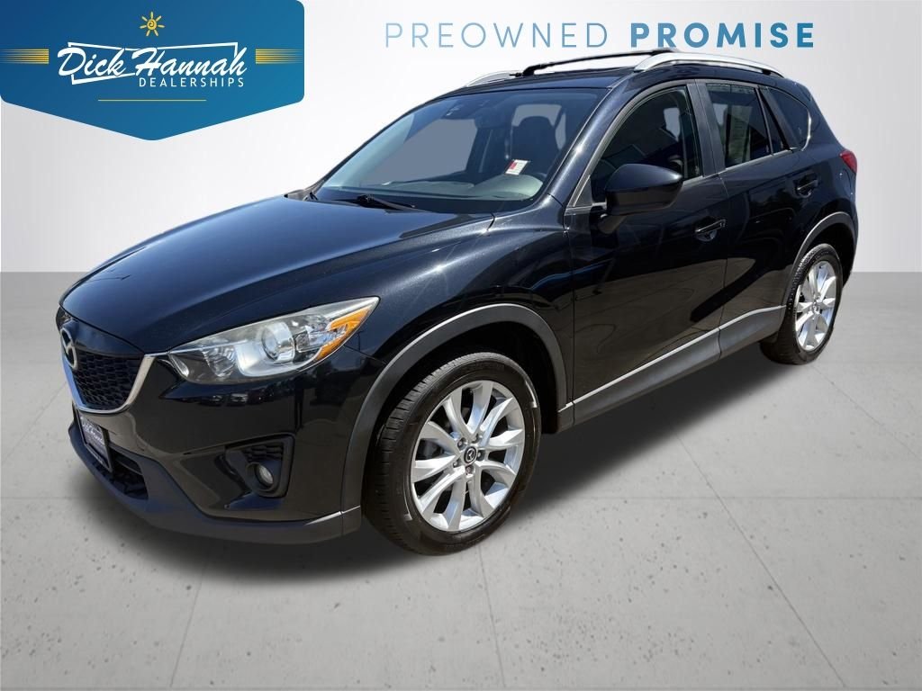 Used 2014 Black Mazda Grand Touring image 1