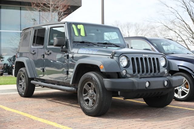 Used 2017 Gray Jeep Unlimited Sport image 1