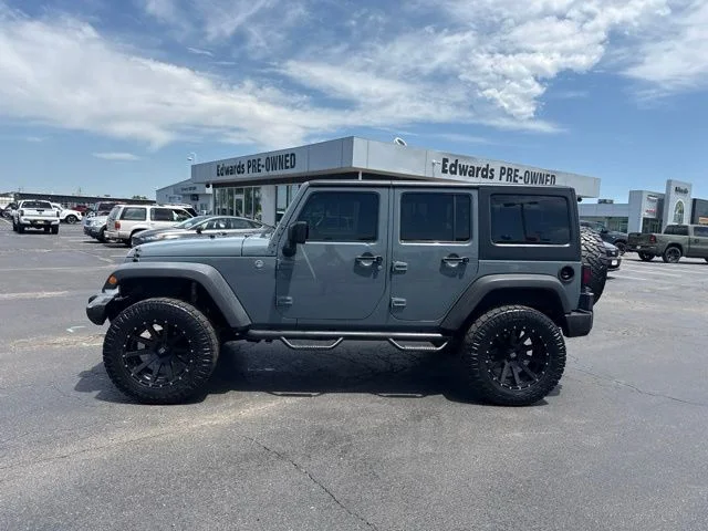 Used 2014 Gray Jeep Unlimited Sport image 4