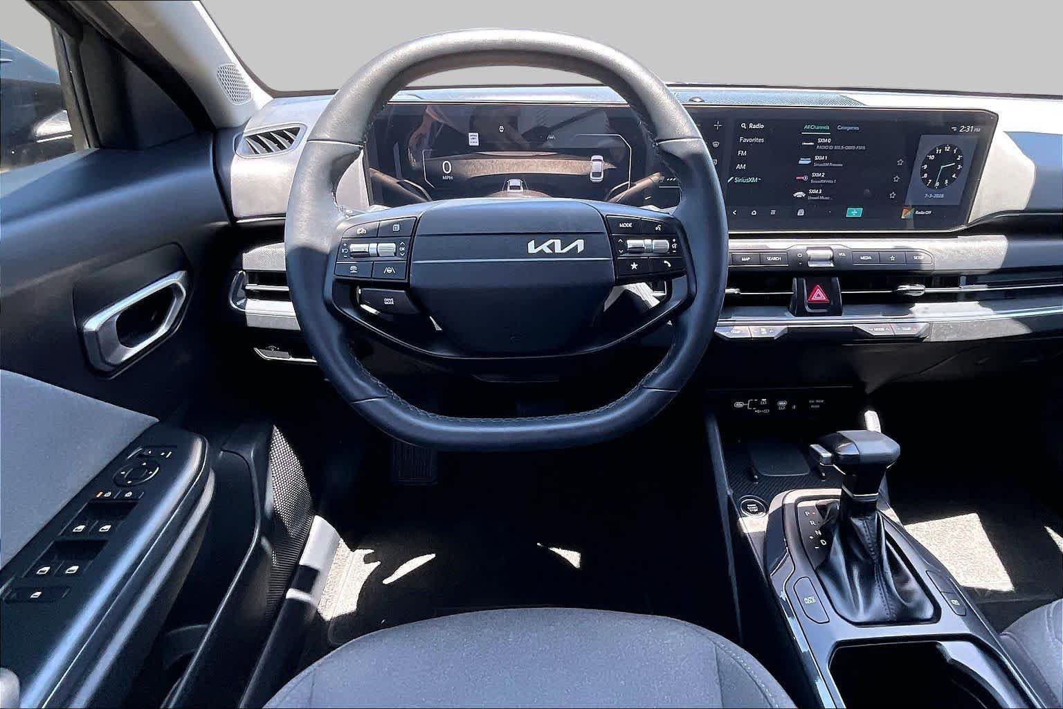 Used 2025 Interstellar Gray Kia EX image 6