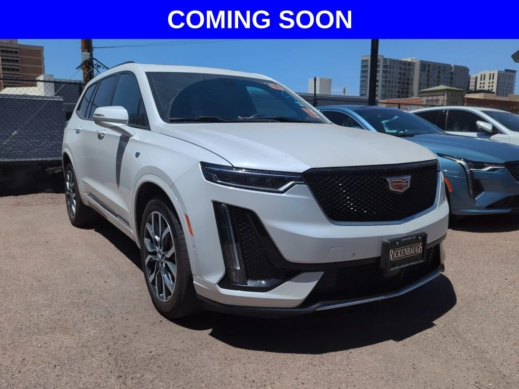 Used 2025 White Cadillac Sport image 1