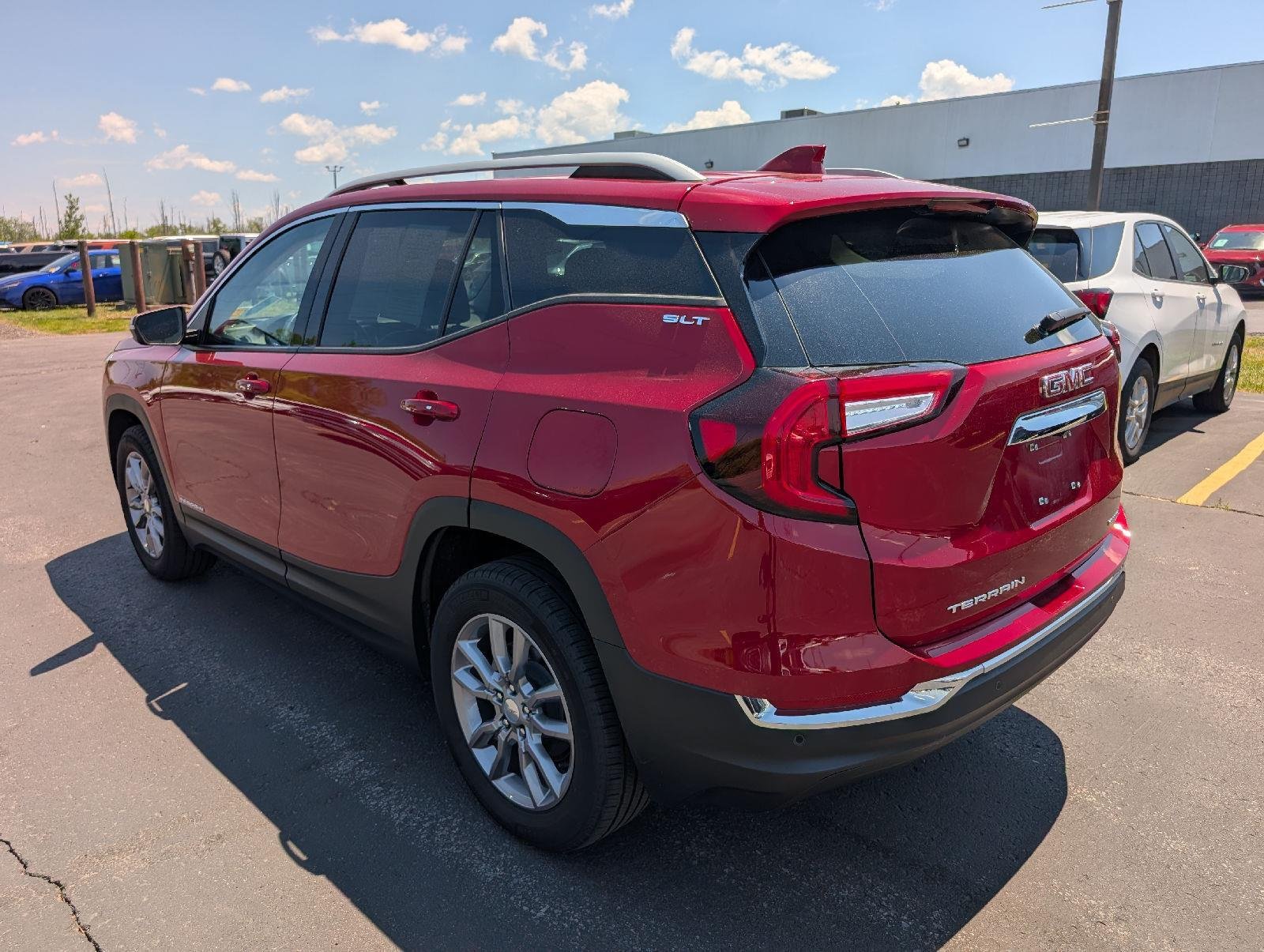 Used 2024 Volcanic Red Tintcoat GMC SLT image 5
