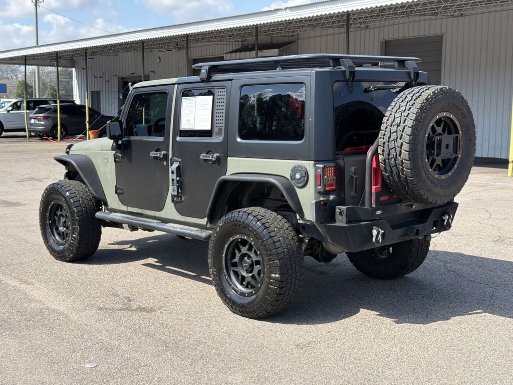 Used 2017 Jeep Wrangler Unlimited Sport with VIN 1C4BJWDG9HL737885 for sale in Opelika, AL