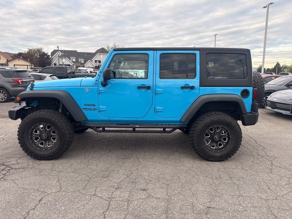 Certified Used 2017 Chief Clearcoat Jeep Unlimited Sport image 14