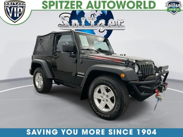 Used 2013 Black Clearcoat Jeep Sport image 3