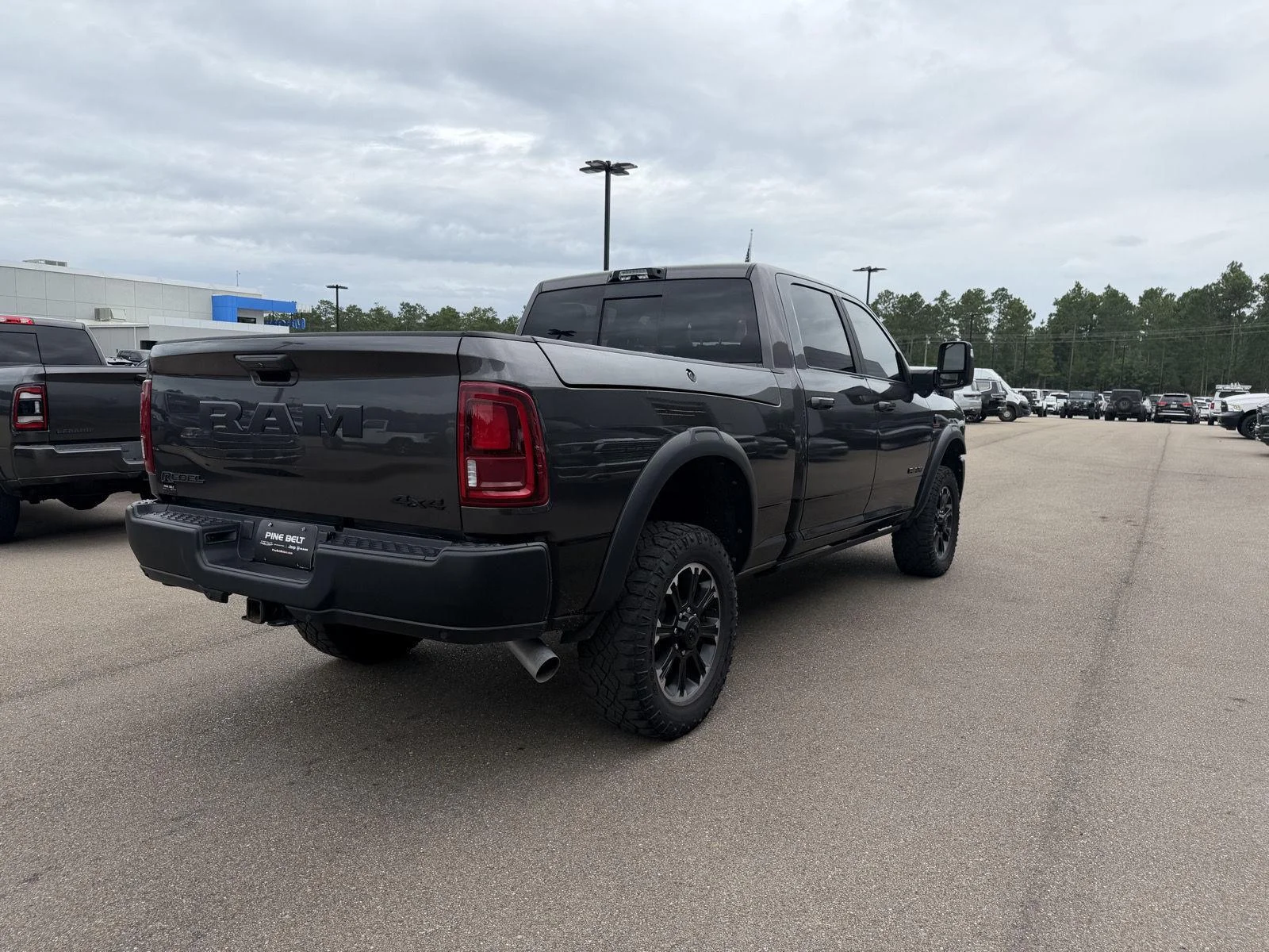 Used 2025 Granite Crystal Metallic Clearcoat Ram Rebel image 6