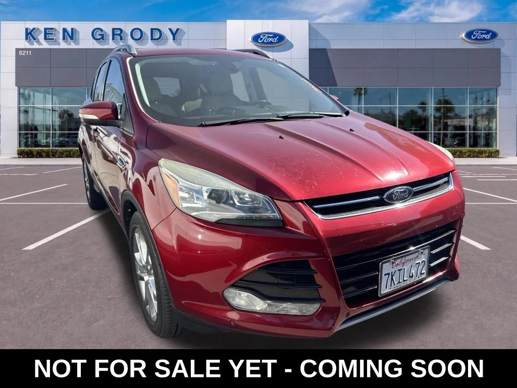Used 2015 Red Ford Titanium image 1