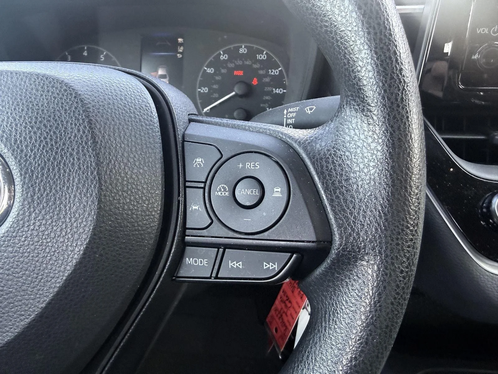 Used 2023 Midnight Black Metallic Toyota LE image 9
