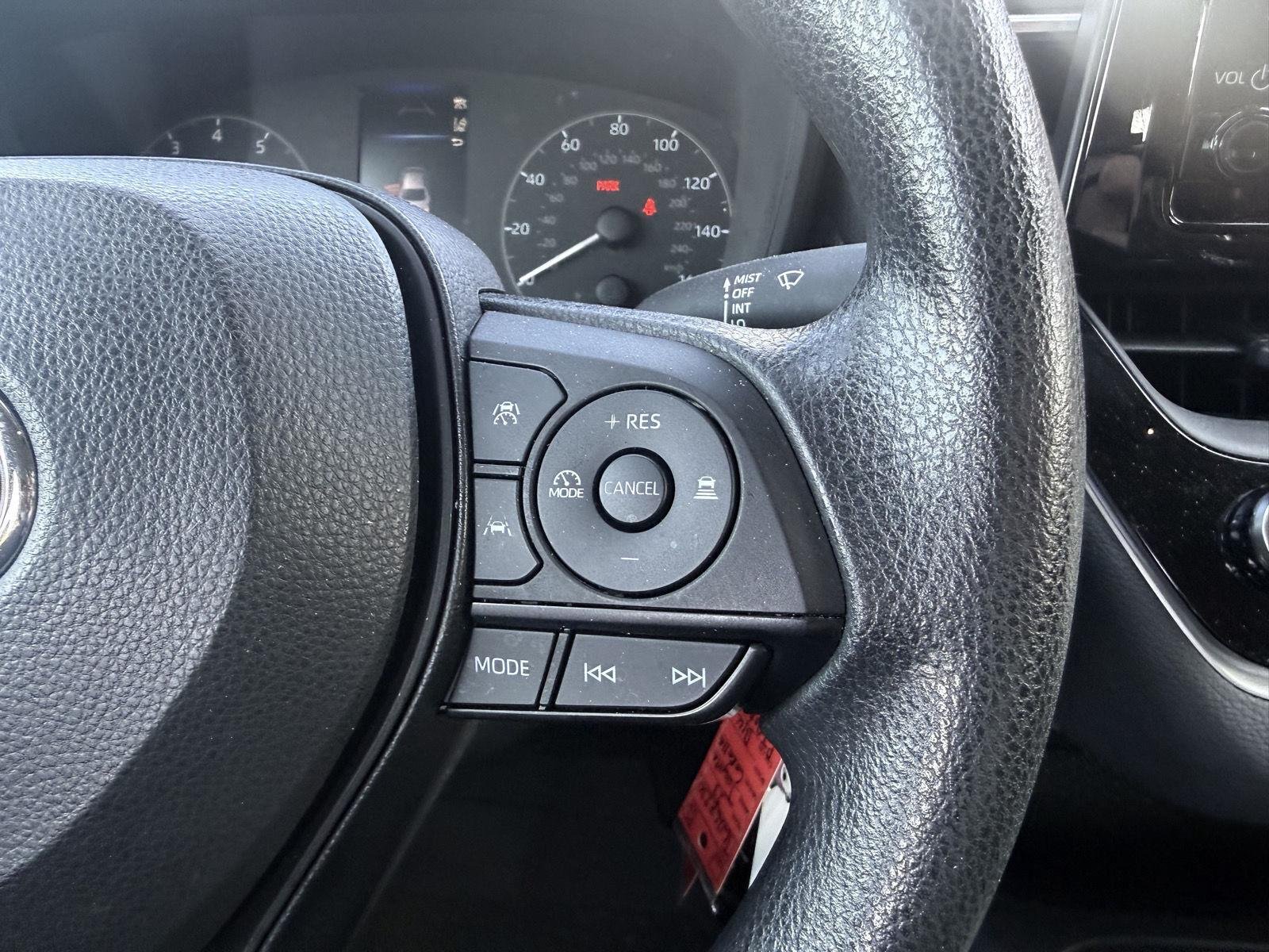 Used 2023 Midnight Black Metallic Toyota LE image 9