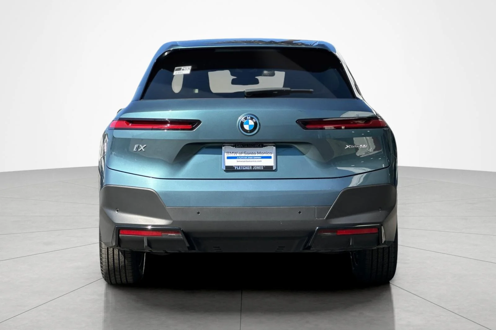 Used 2024 Blue Ridge Mountain Metallic BMW xDrive50 image 4