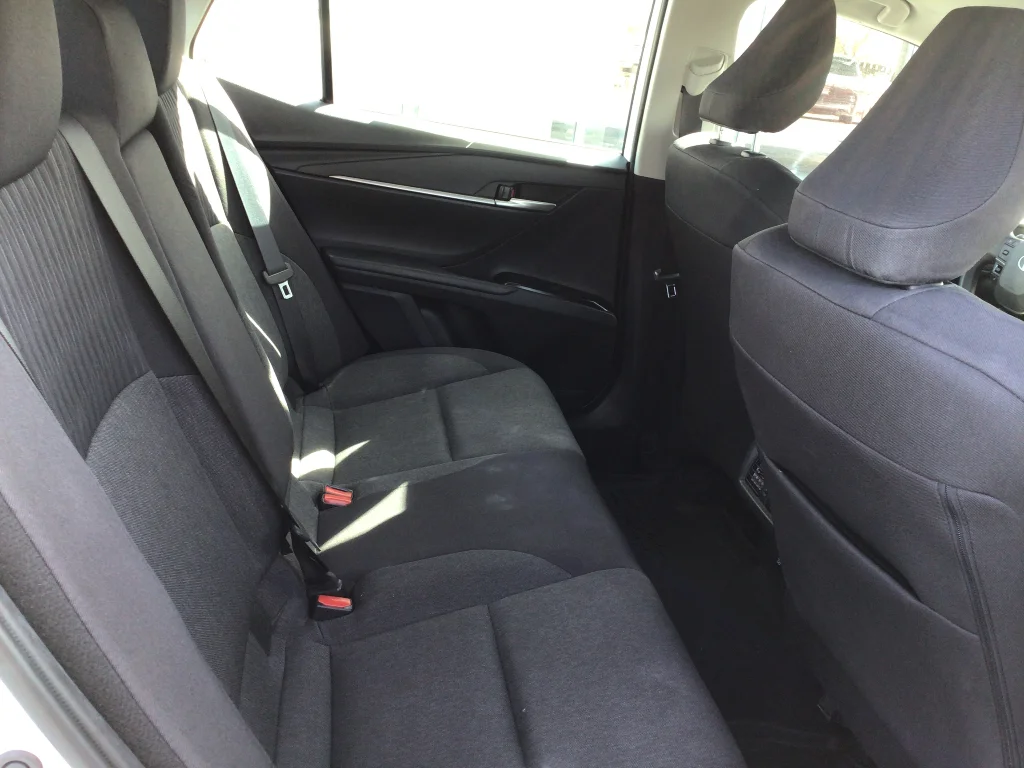 Used 2025 White Toyota LE HYBRID image 7
