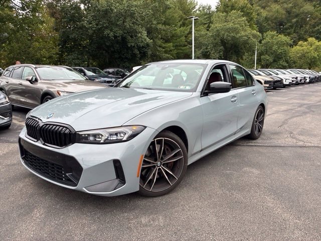 Used 2023 Brooklyn Gray Metallic BMW 330i xDrive image 1