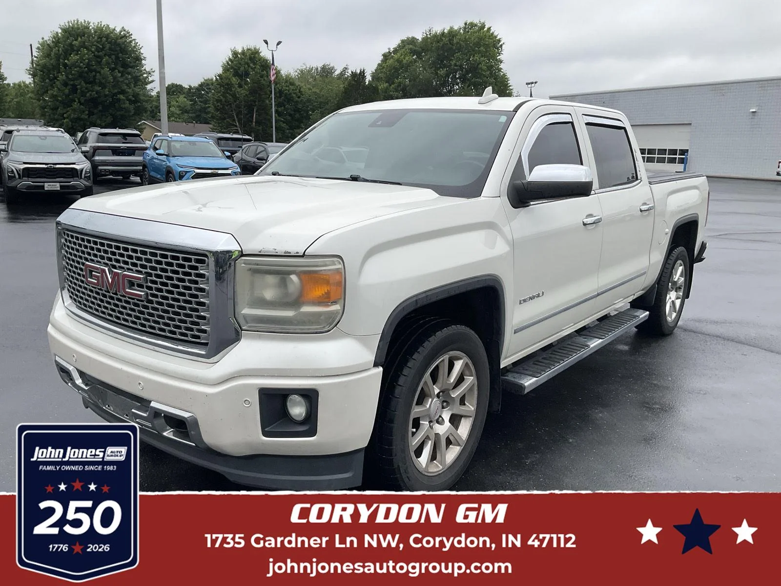 Used 2015 White Diamond Tricoat GMC Denali image 1