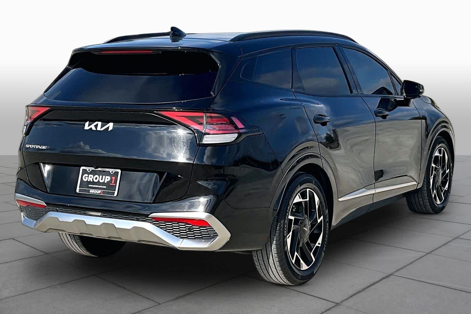 Used 2023 Ebony Black Kia SX-Prestige image 12