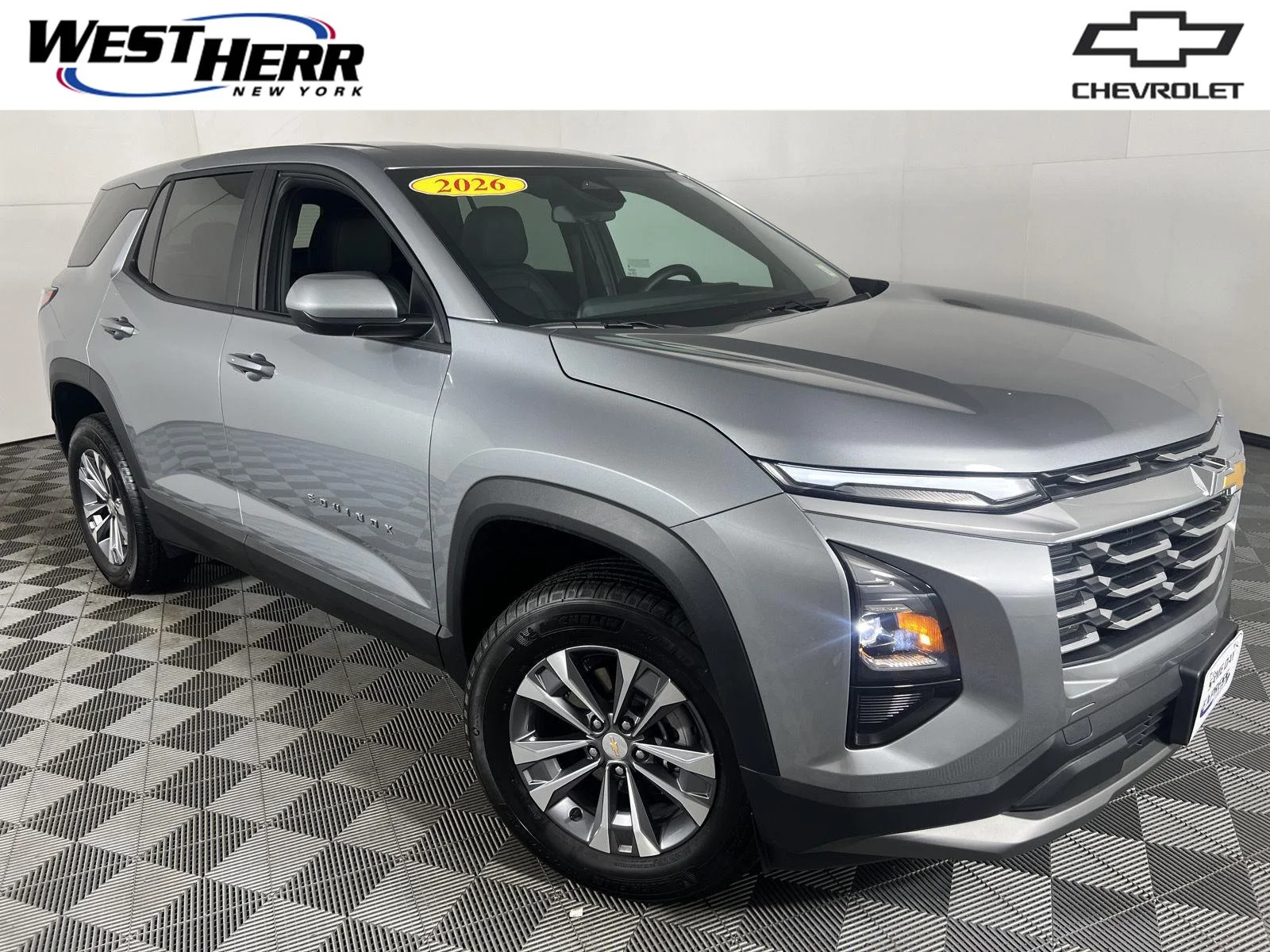 Used 2026 Sterling Gray Metallic Chevrolet AWD LT image 1