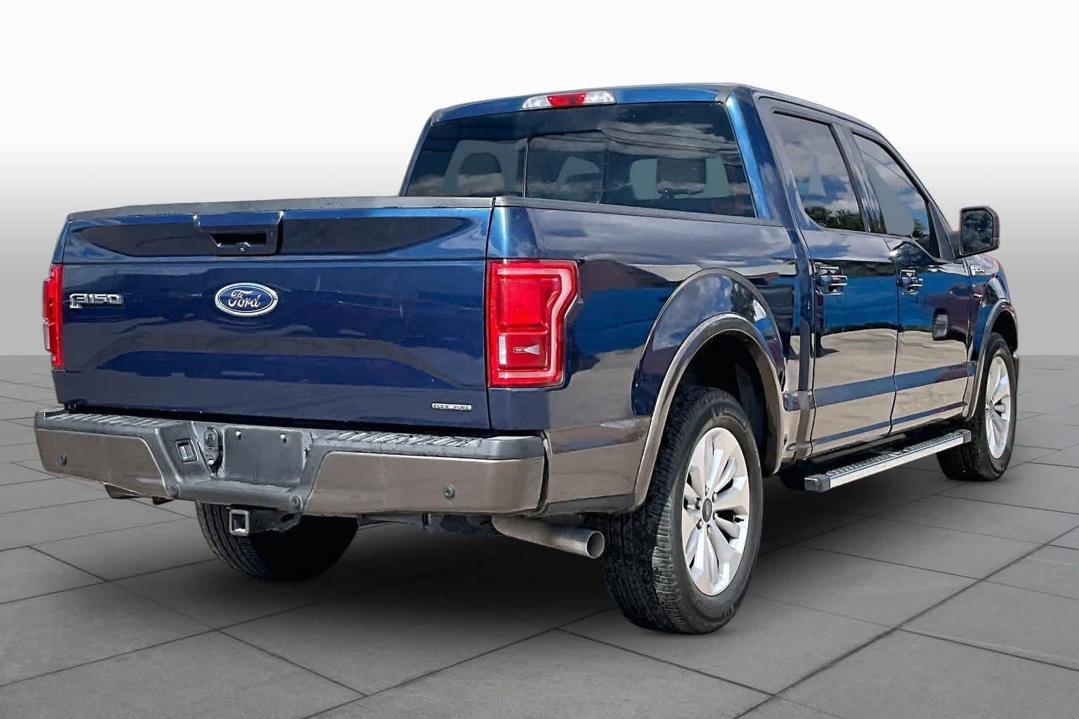 Used 2015 Blue Jeans Metallic/Caribou Metallic Ford Lariat image 13