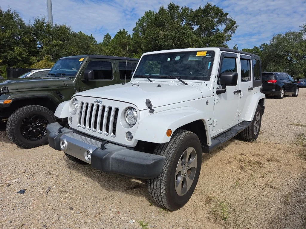 Used 2017 White Jeep Unlimited Sahara image 4