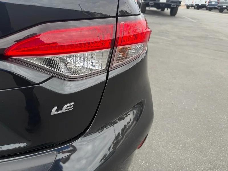Used 2022 Black Sand Pearl Toyota LE image 23