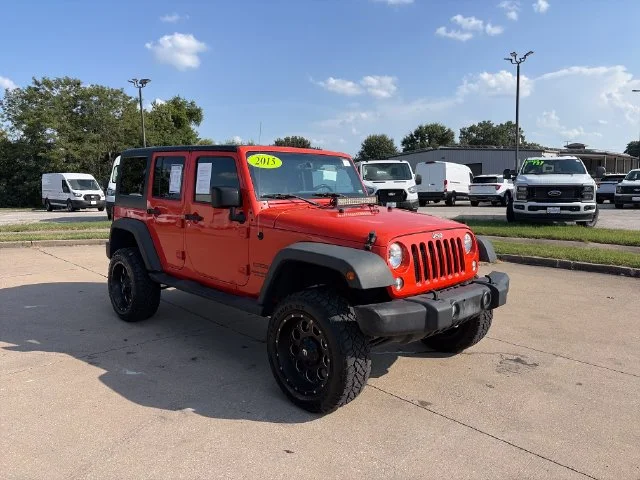 Used 2015 Orange Jeep Unlimited Sport image 7