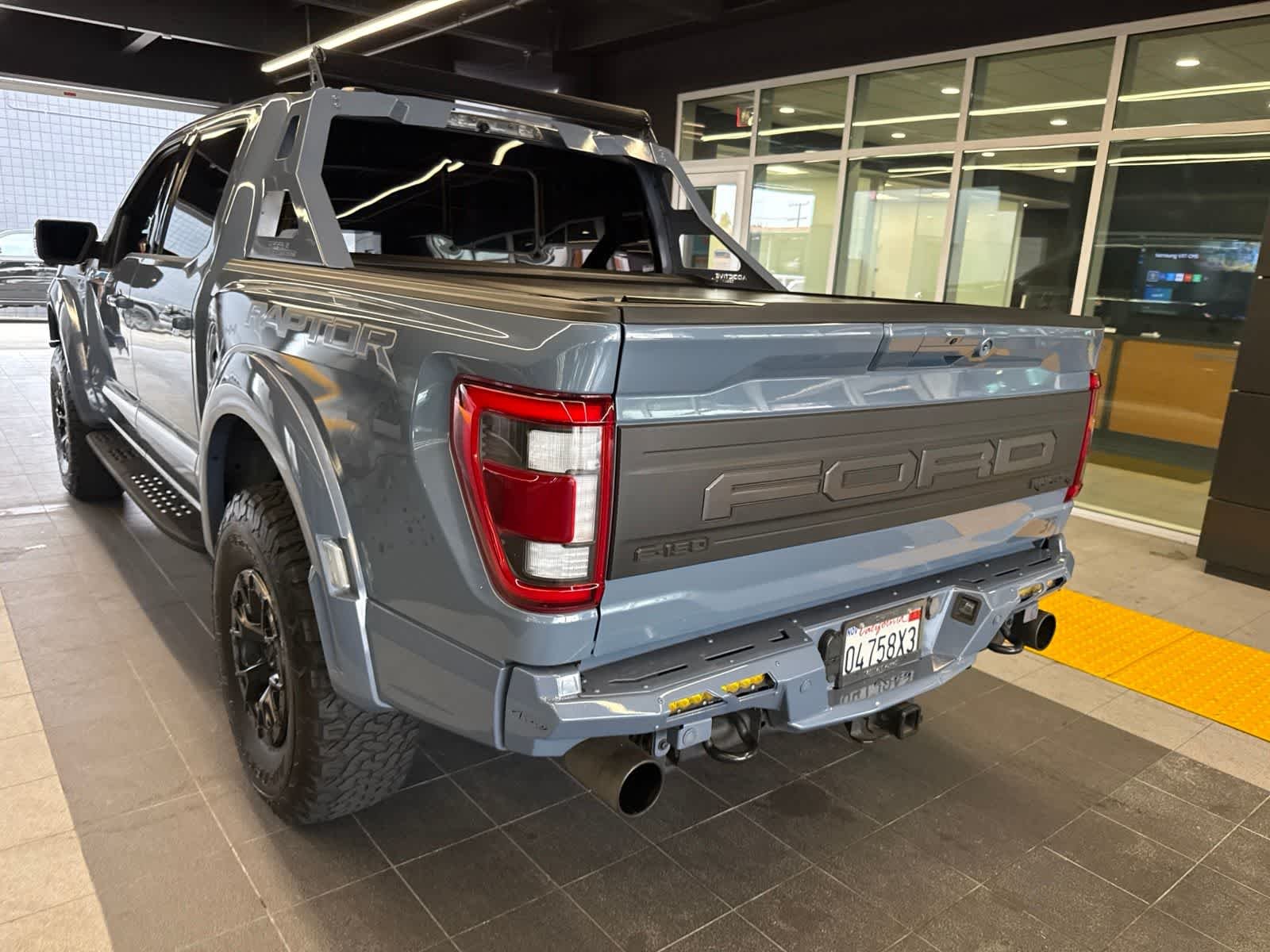 Used 2023 Azure Gray Metallic Tri-Coat Ford Raptor image 18
