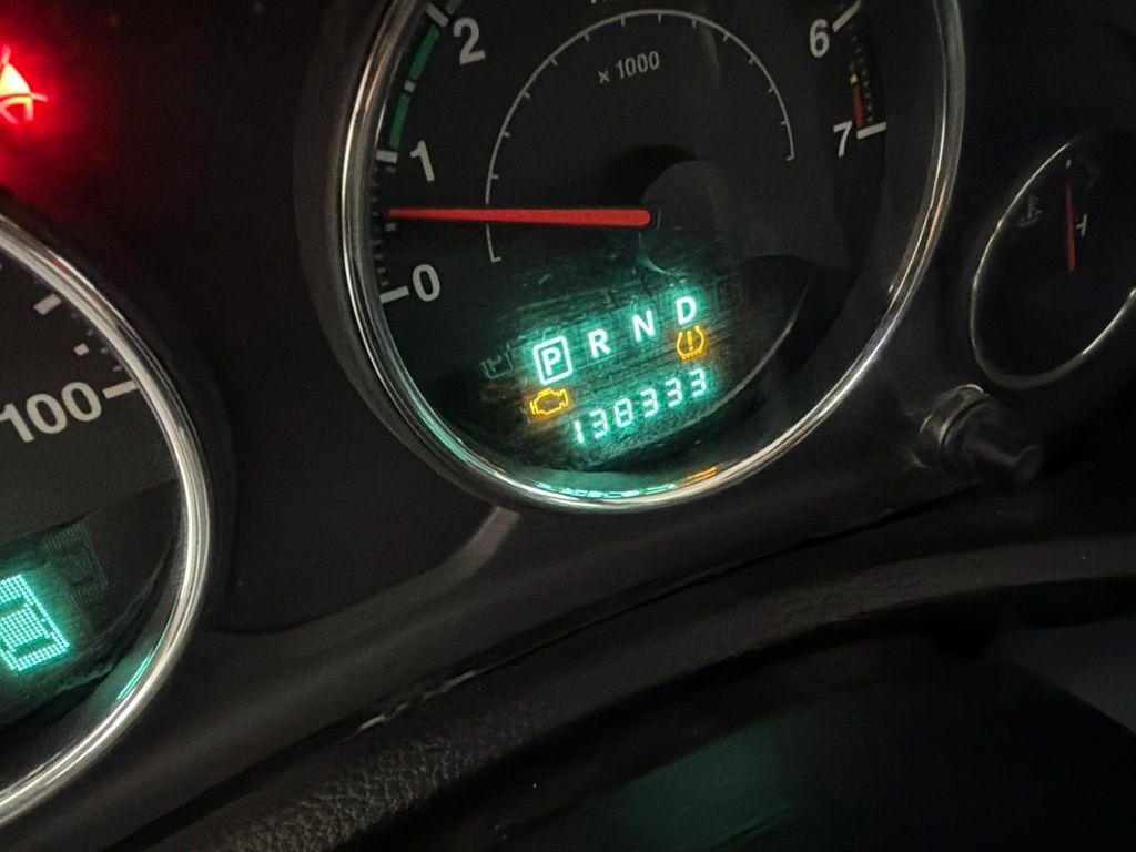 Used 2012 Silver Jeep Unlimited Sahara image 9