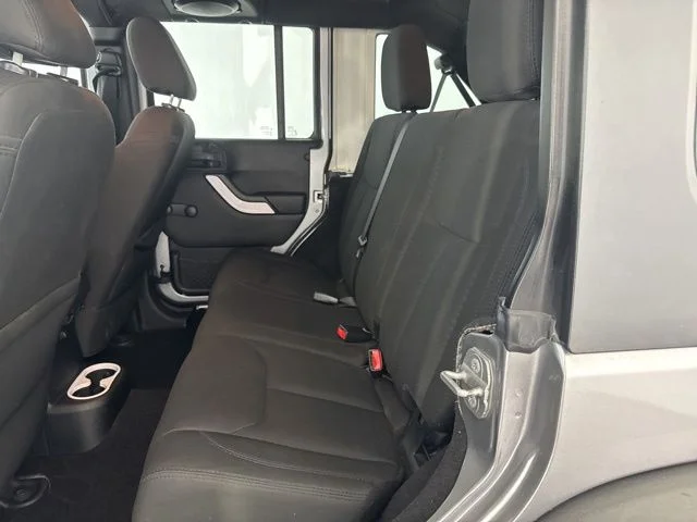 Used 2014 Silver Jeep Unlimited Sport image 26