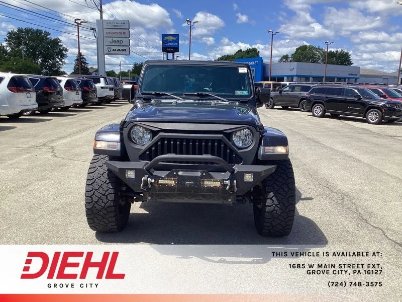 Used 2018 Black Jeep Unlimited Sahara image 2