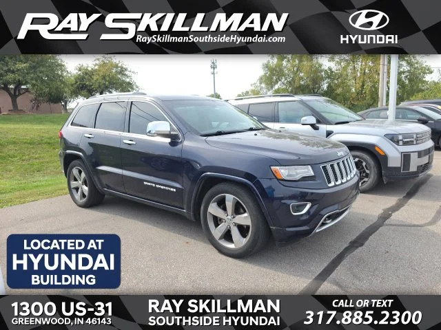 Used 2014 Blue Jeep Overland image 1