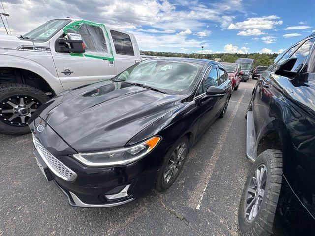 Used 2020 Ford Fusion Hybrid Titanium with VIN 3FA6P0RU1LR113199 for sale in Castle Rock, CO