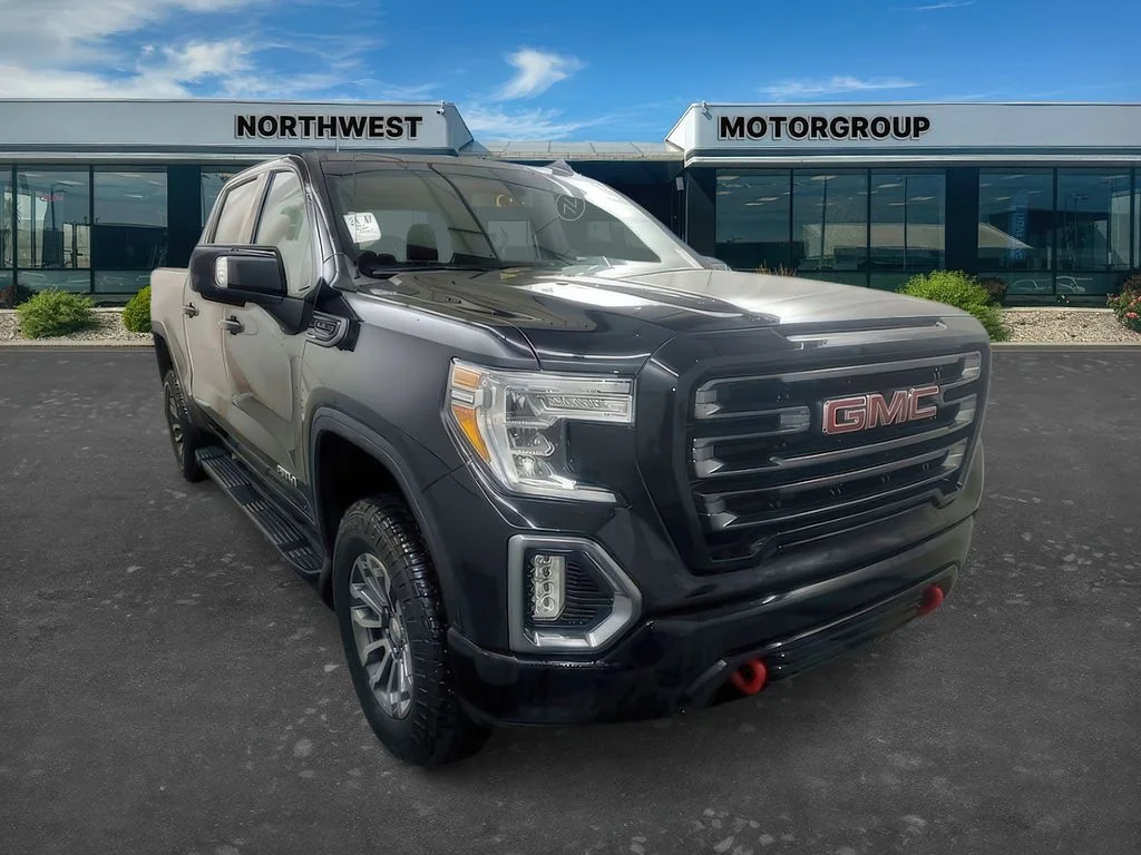 Used 2021 Ebony Twilight Metallic GMC AT4 image 1
