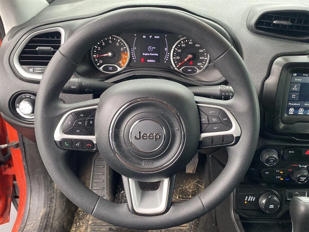 Used 2018 Omaha Orange Jeep Sport image 17