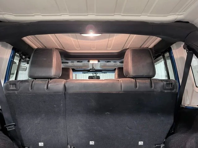Used 2014 Blue Jeep Unlimited Sahara image 5