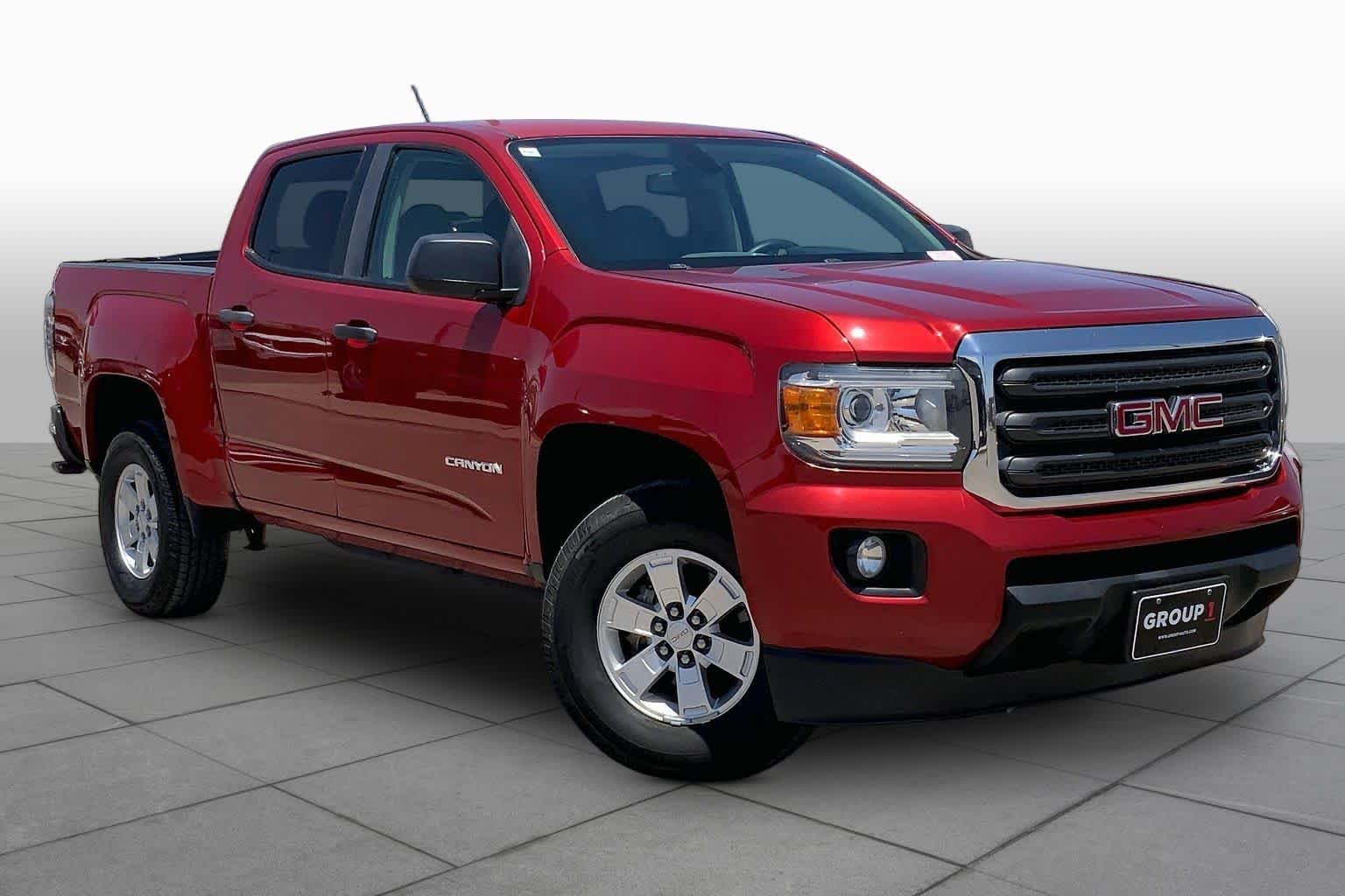Used 2016 Copper Red Metallic GMC 2WD image 2