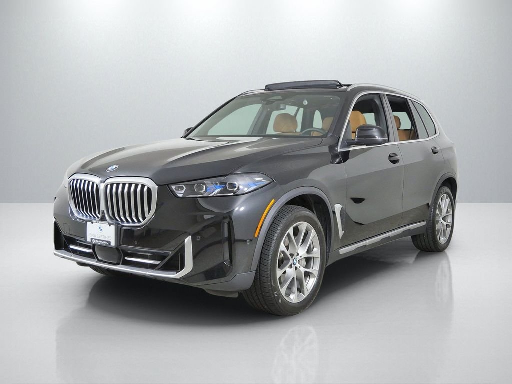 Certified Used 2024 Black Sapphire Metallic BMW xDrive40i image 1