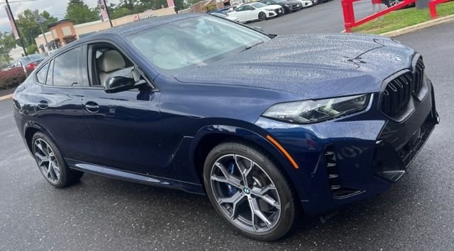 Certified Used 2025 Blue BMW M60i image 1
