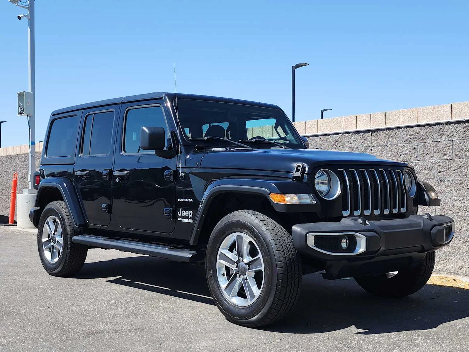 Used 2022 Black Clearcoat Jeep Unlimited Sahara image 2