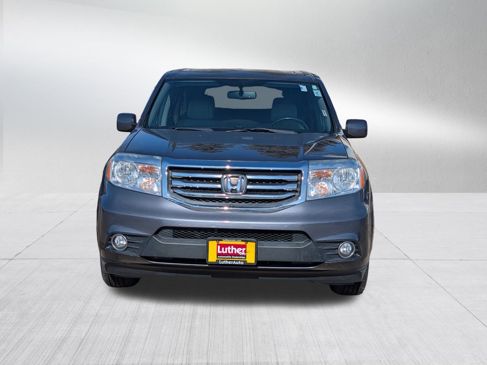 Used 2014 Honda Pilot EX-L with VIN 5FNYF4H52EB044860 for sale in Saint Paul, MN