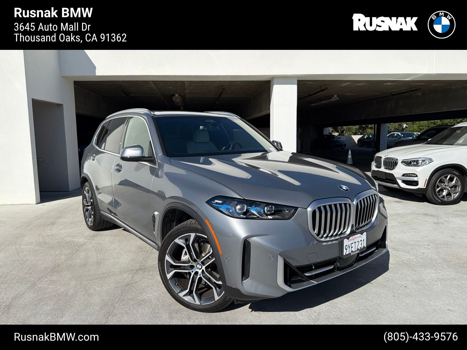 Used 2026 Skyscraper Grey Metallic BMW xDrive40i image 1