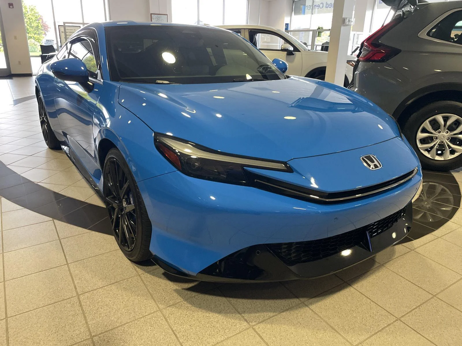 Used 2026 Boost Blue Pearl Honda Hybrid image 1