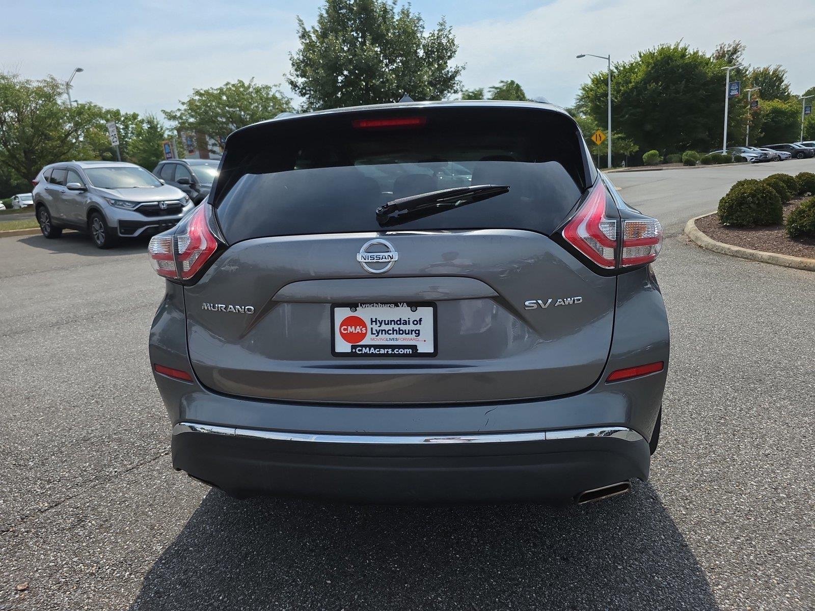 Used 2016 Gun Metallic Nissan SV image 16