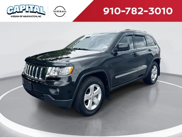 Used 2012 Black Jeep Laredo image 1